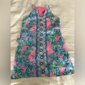 Lilly Pulitzer pearl pineapple romper.